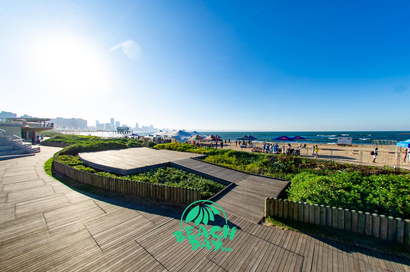 Beach Day Durban beachfront setup with tents and the city skyline